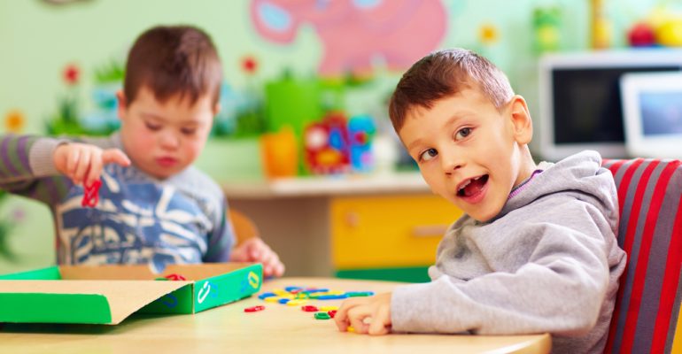 Cute,Kids,With,Special,Needs,Playing,With,Developing,Toys,While